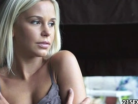 Seductive blonde teen masturbates with a dildo